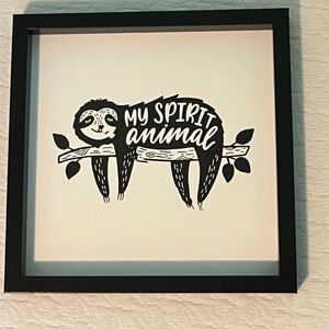 Spirit Animal sloth wall hanging.